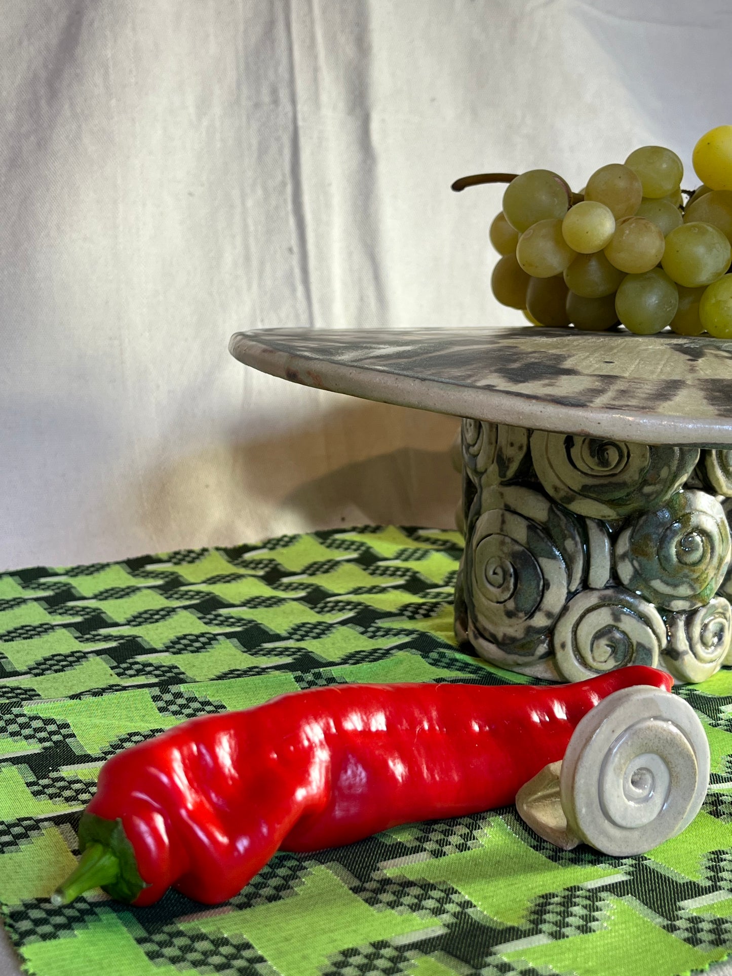 PLAT A PARTAGER SUSPENDU