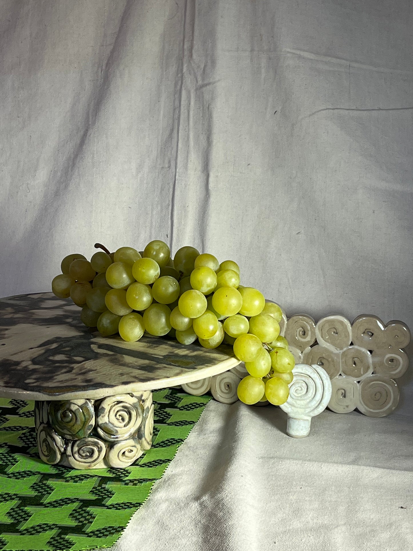 PLAT A PARTAGER SUSPENDU