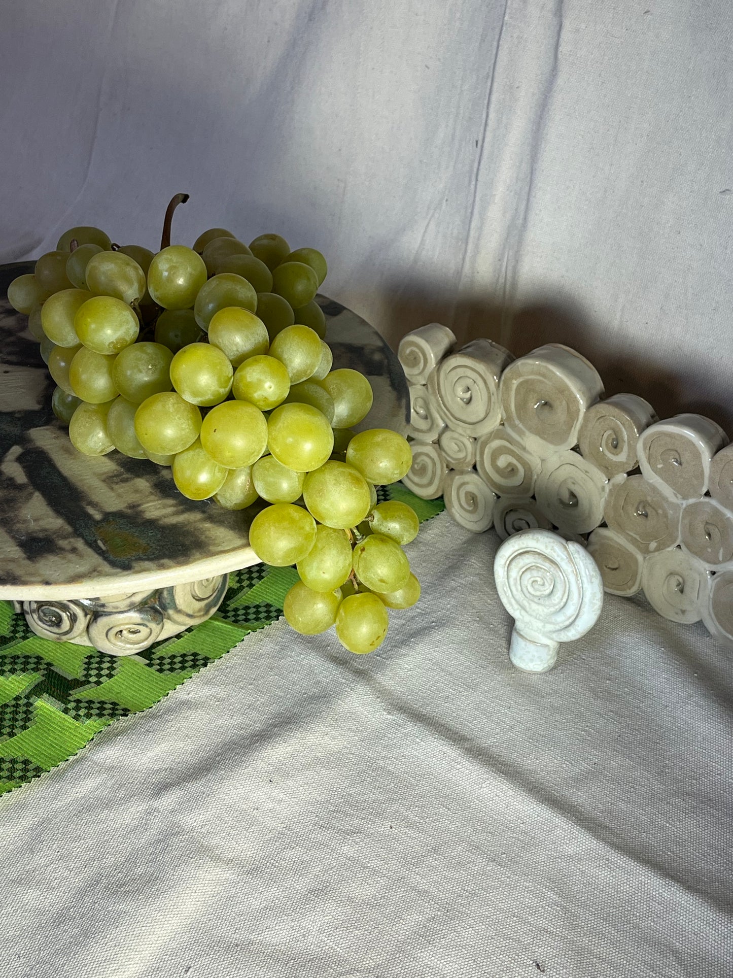 PLAT A PARTAGER SUSPENDU