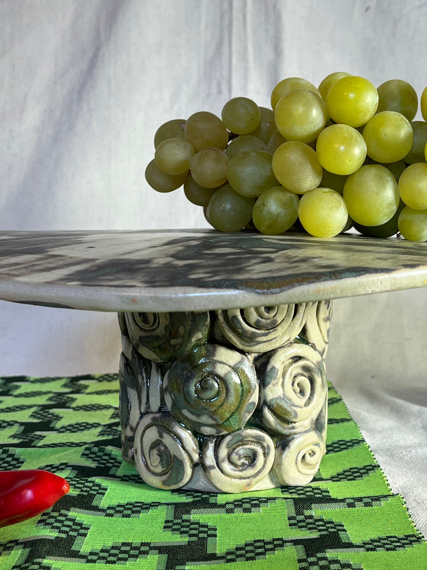 PLAT A PARTAGER SUSPENDU